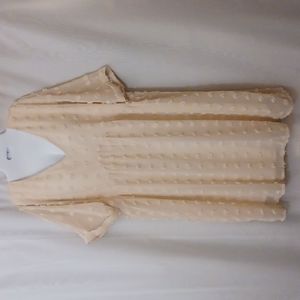 KIRUNDO Beige V Neck Mini Dress with Swiss Dots.